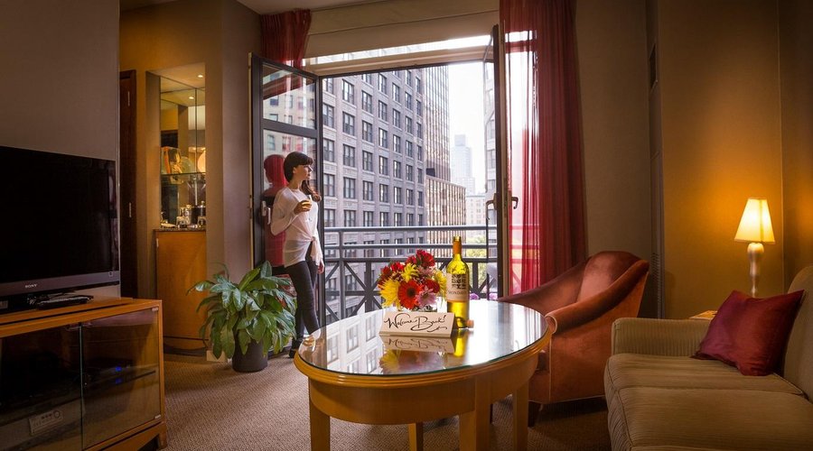 Relax & enjoy the view from your Balcony King Suite! All Balcony King Suites overlook Park Ave S