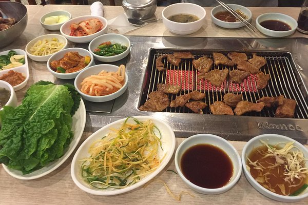 BBQ grill at our table, Amiso Korean Restaurant, Myeongdong District,  Jung-gu, Seoul. - Picture of Amiso, Seoul - Tripadvisor