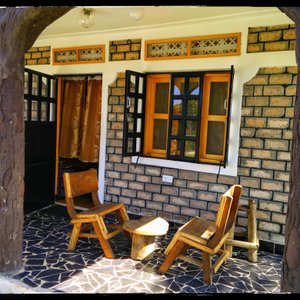 Cosy selfcontained cottage at Orchids Village