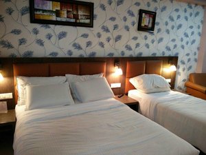 Pride Ananya Resort in Puri, image may contain: Dorm Room, Furniture, Bed, Bedroom