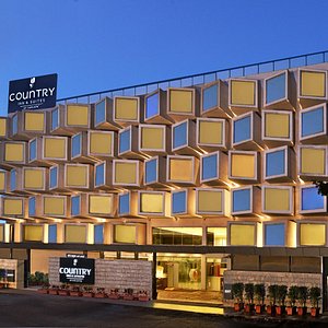 Country Inn & Suites by Radisson, Bengaluru Hebbal Road in Bengaluru, image may contain: Office Building, Hotel, Condo, City