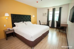 Apollonia Royale Hotel in Luzon, image may contain: Interior Design, Chair, Furniture, Bed
