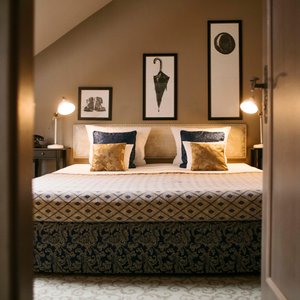 Hotel Jagerhorn in Zagreb, image may contain: Furniture, Painting, Bed, Corner