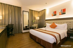 Ace Hotel & Suites in Luzon, image may contain: Bedroom, Indoors, Furniture, Bed