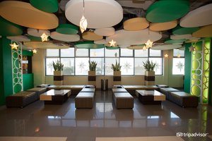Go Hotels Otis-Manila in Luzon, image may contain: Restaurant, Indoors, Living Room, Couch