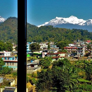 This is the view from the mountain view room.Window panoramic view of fishtail and annapurna ran