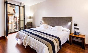 Hotel Monjas Del Carmen in Granada, image may contain: Furniture, Interior Design, Bed, Bedroom