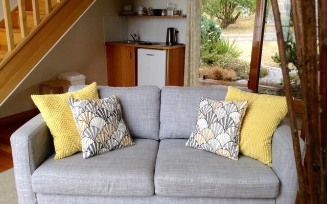 2story suite's sofa and kitchenette