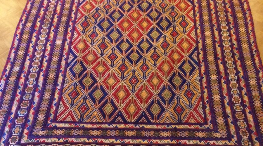 handmade tribal carpet with unique colours