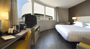 AC Hotel by Marriott Marseille Prado Velodrome in Marseille, image may contain: Penthouse, Furniture, Bedroom, Monitor
