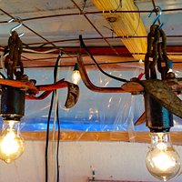 Vintage farm equipment turned into a light.