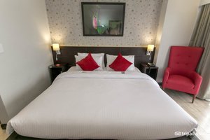 Venus Parkview Hotel in Luzon, image may contain: Cushion, Home Decor, Furniture, Chair