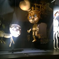 Static sets with different styles of puppets.