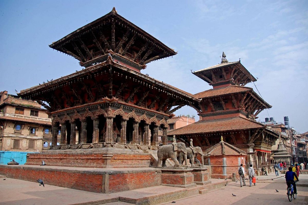 Vishwanatha temple is on the left, Bhimsen temple (3 roofs) is on the right