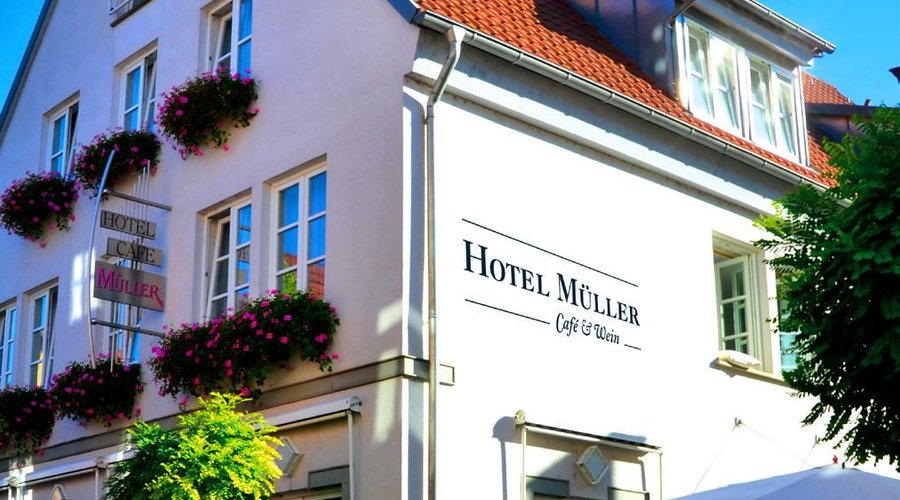 Mondholzhotel | Hotel Müller Café & Wein