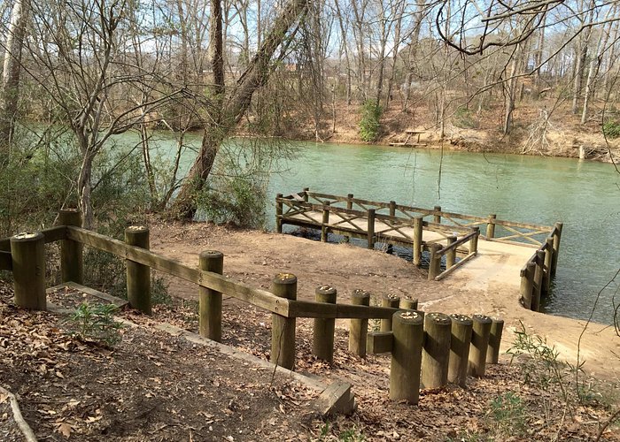 Beautiful paved trail along the Catawba River with outdoor fitness challenges along the way