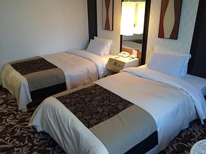 New Otani Inn Tokyo in Osaki, image may contain: Bed, Furniture, Dorm Room, Hotel