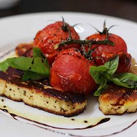 Grilled Haloumi with blistered cherry tomatoes and stick balsamic
