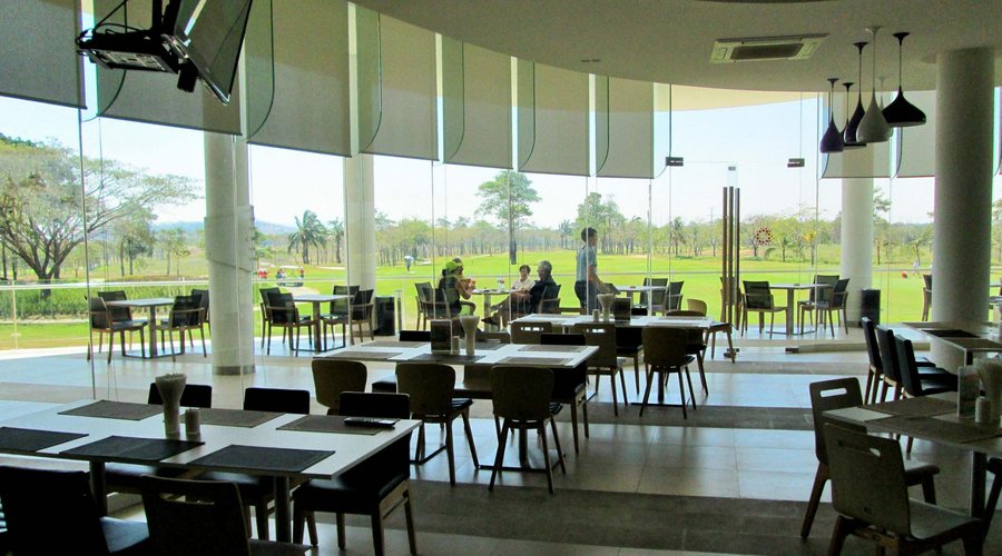 The new panoramic dining room overlooks the 9th and 18th greens