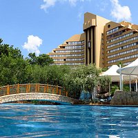Bocado, seen from the pool area, with the restaurant accessed over the footbridge.