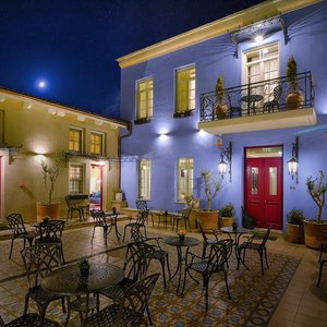 Hotel Antique in Ioannina, image may contain: Couch, Living Room, Interior Design, Chandelier