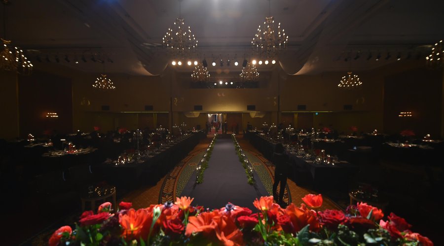 Red decorated wedding at grand ball room_close shot