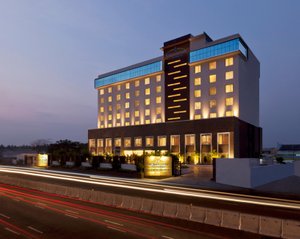 Gokulam Park Coimbatore in Coimbatore, image may contain: Hotel, Office Building, City, Condo