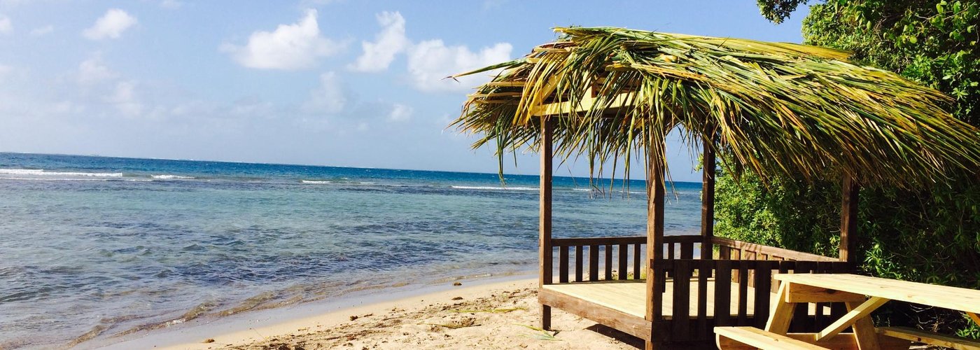 Coconut Thatched Cabana for Reefview Guests privacy & comfort ~ www.reefviewapartments.com