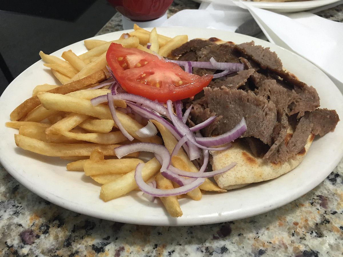 https://dynamic-media-cdn.tripadvisor.com/media/photo-o/0a/a4/be/06/gyro-dinner-with-fries.jpg?w=1200&h=-1&s=1