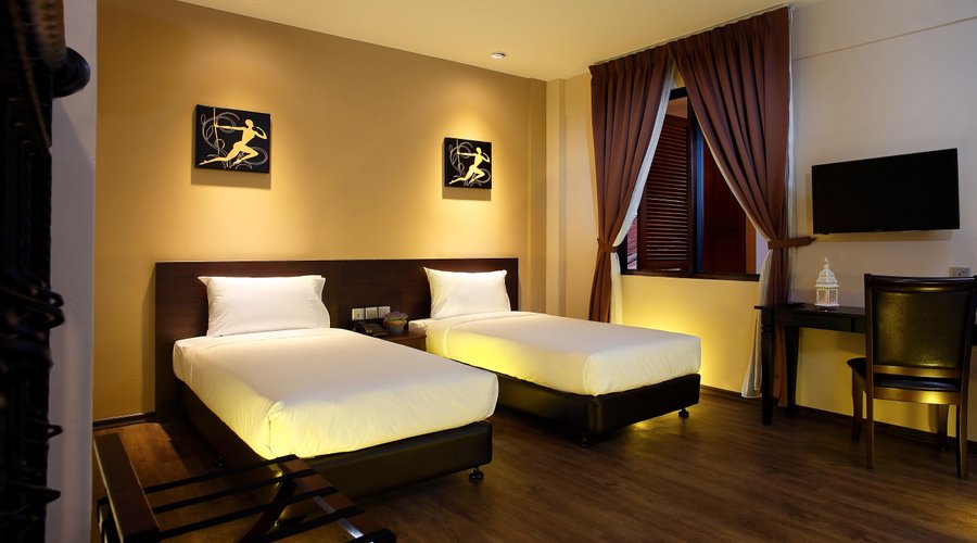 Twin bed of Raffles Family Suite