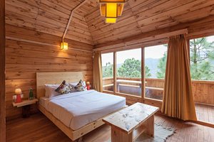 Suro Treehouse Resort in Shimla, image may contain: Interior Design, Wood, Hardwood, Stained Wood