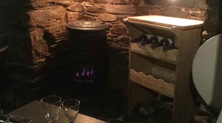 Cosy table for 2 by the fire