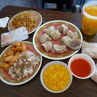 (Clockwise from top left) Lo Mein, Dumplings, Egg Drop Soup, Sweet and Sour Chicken