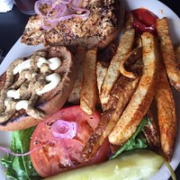 Grilled chicken sandwich with spicy fries