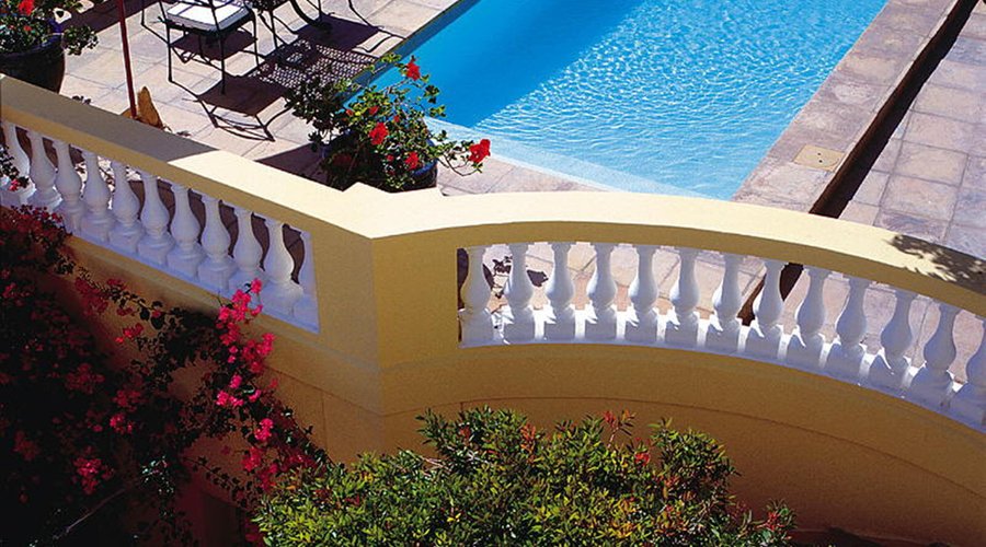 Swimming Pool with panoramic view from Table Mountain to False Bay beaches, the South Atlantic O