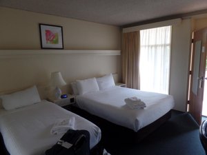 Waterview Gosford Motor Inn in Gosford, image may contain: Bed, Furniture, Handbag, Bedroom