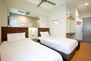 Tune Hotel Kota Bahru City Centre in Kota Bharu, image may contain: Ceiling Fan, Electrical Device, Furniture, Bed
