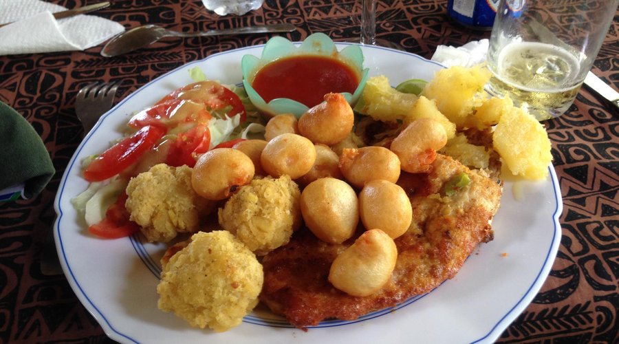 My "mixed seafood" plate, with grilled fish, fried calamari, and some fried breadfruit balls.