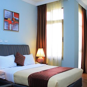 Hotel Lobelia in Addis Ababa, image may contain: Furniture, Bedroom, Bed, Table Lamp