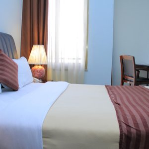 Hotel Lobelia in Addis Ababa, image may contain: Furniture, Bedroom, Bed, Table Lamp