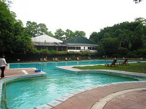 Tollygunge Club in Kolkata (Calcutta), image may contain: Pool, Hotel, Villa, Person