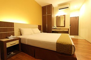 Seasons View Hotel - Kuantan in Kuantan, image may contain: Furniture, Bed, Bedroom, Indoors