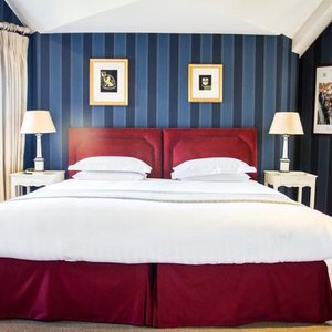 The 'Kent' bedroom with disabled bathroom facilities and two pull out beds for families (Photo c