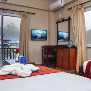 Pokhara Choice Inn in Pokhara, image may contain: Hotel, Resort, Furniture, Monitor