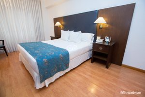 Hotel Dolmen in Buenos Aires, image may contain: Furniture, Interior Design, Bed, Bedroom
