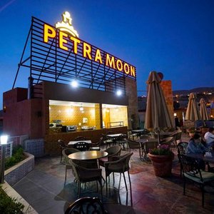 Petra Moon Hotel in Petra - Wadi Musa, image may contain: Hotel, Resort, Furniture, Bed