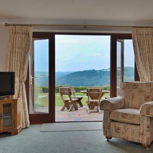 Cottage lounge with patio doors