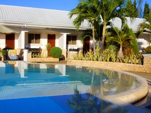 Panglao Regents Park Resort in Panglao Island, image may contain: Villa, Hotel, Resort, Pool