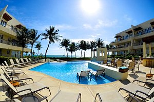 The Phoenix Resort in Ambergris Caye, image may contain: Hotel, Resort, Villa, Pool