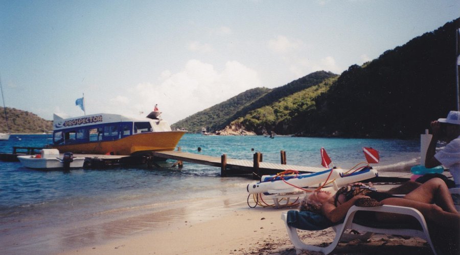 Prospect Reefs beach on Norman Island. The glass bottomed Prospector Boat/Taxi.